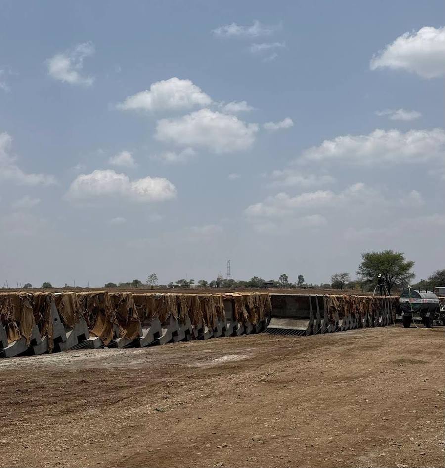 Precast yard, units curing under jute